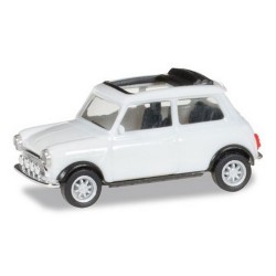 Austin Mini Cooper (1959) blanche avec toit bâché ouvert et feux additionnels