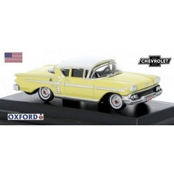 Chevrolet Impala Sport coupé (1958) jaune clair à toit blanc